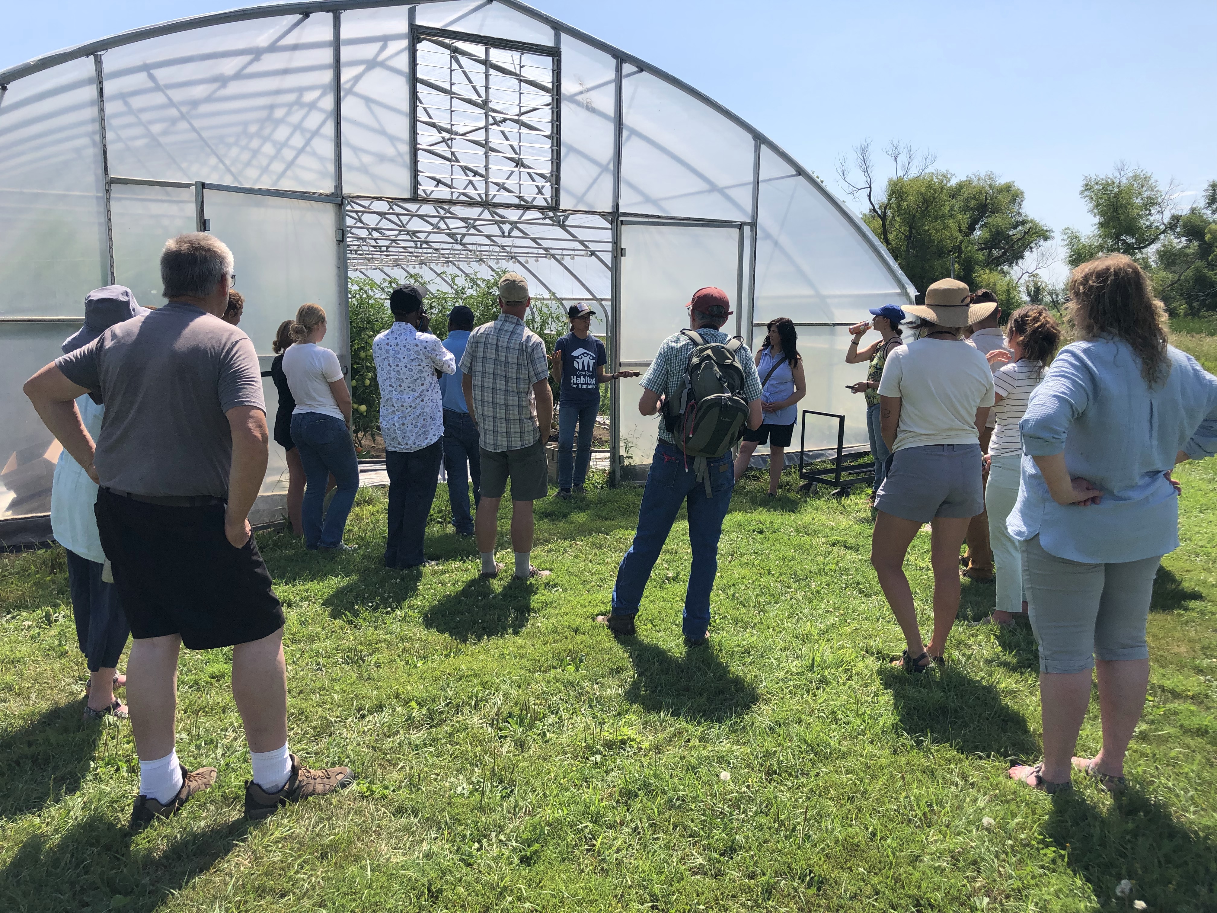 School staff tour Loon Organics Farm in Hutchinson.