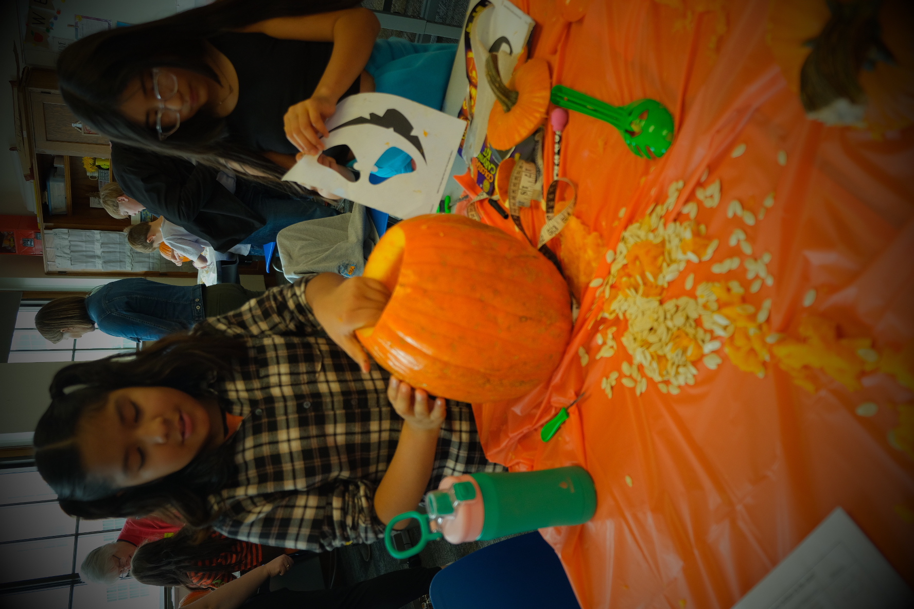 Pumpkin carving activity in Hutchinson.