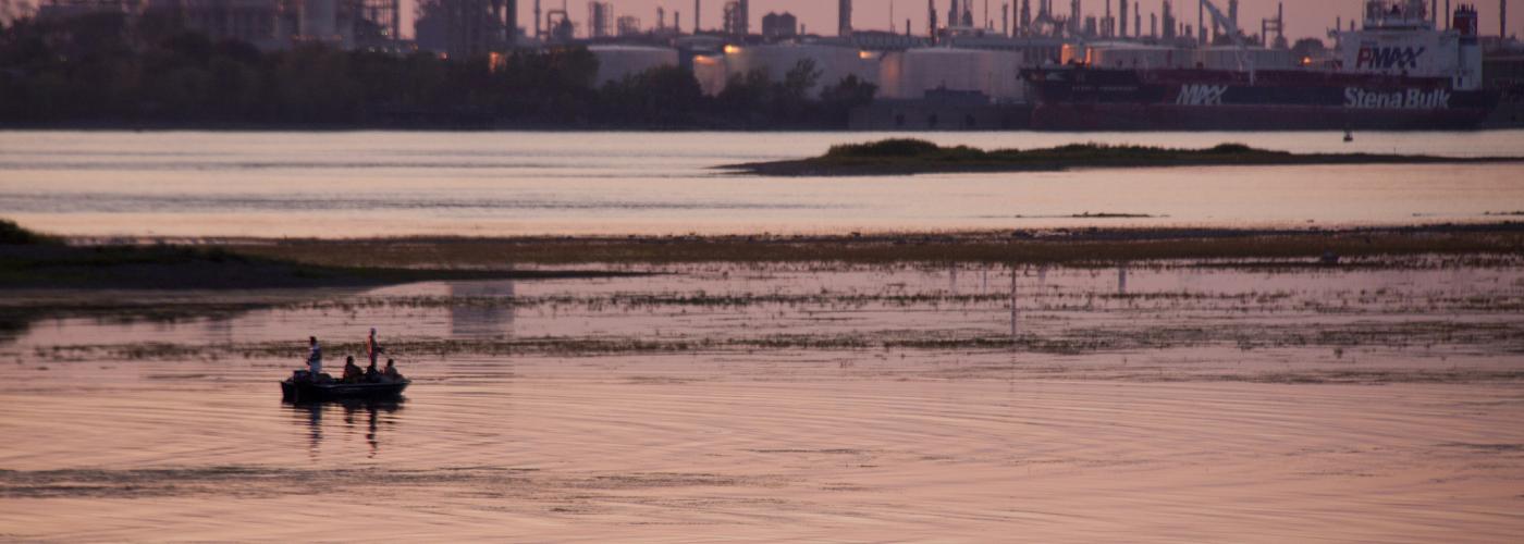 Polluted water next to refinery