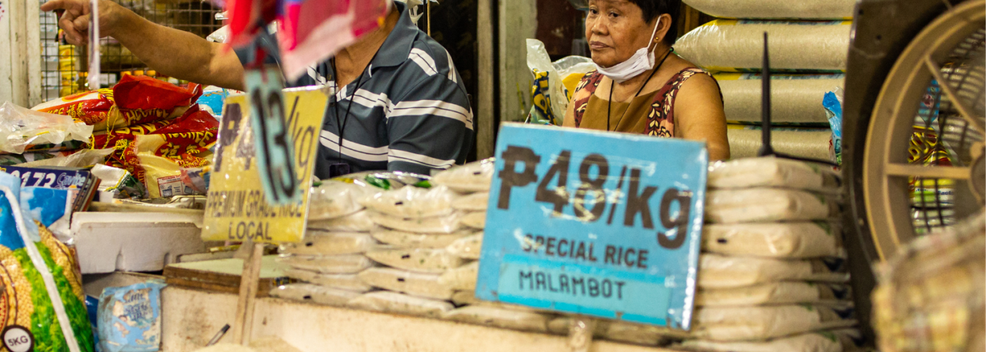 Rice vendor in the Philippines by Paul Ricafrente