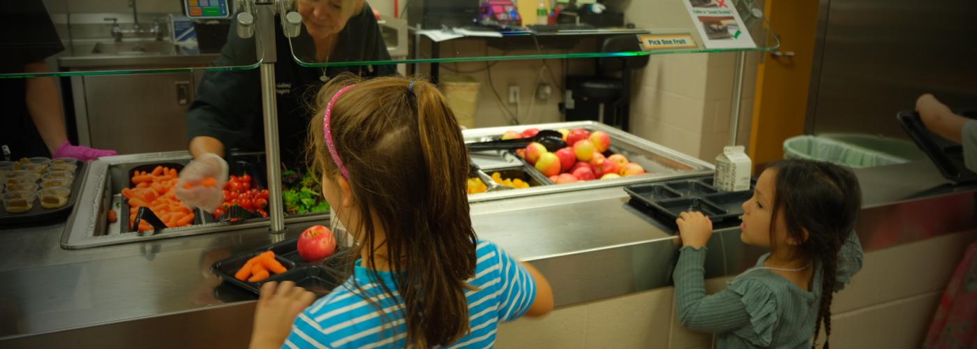 Children in line for local foods at their school cafeteria.