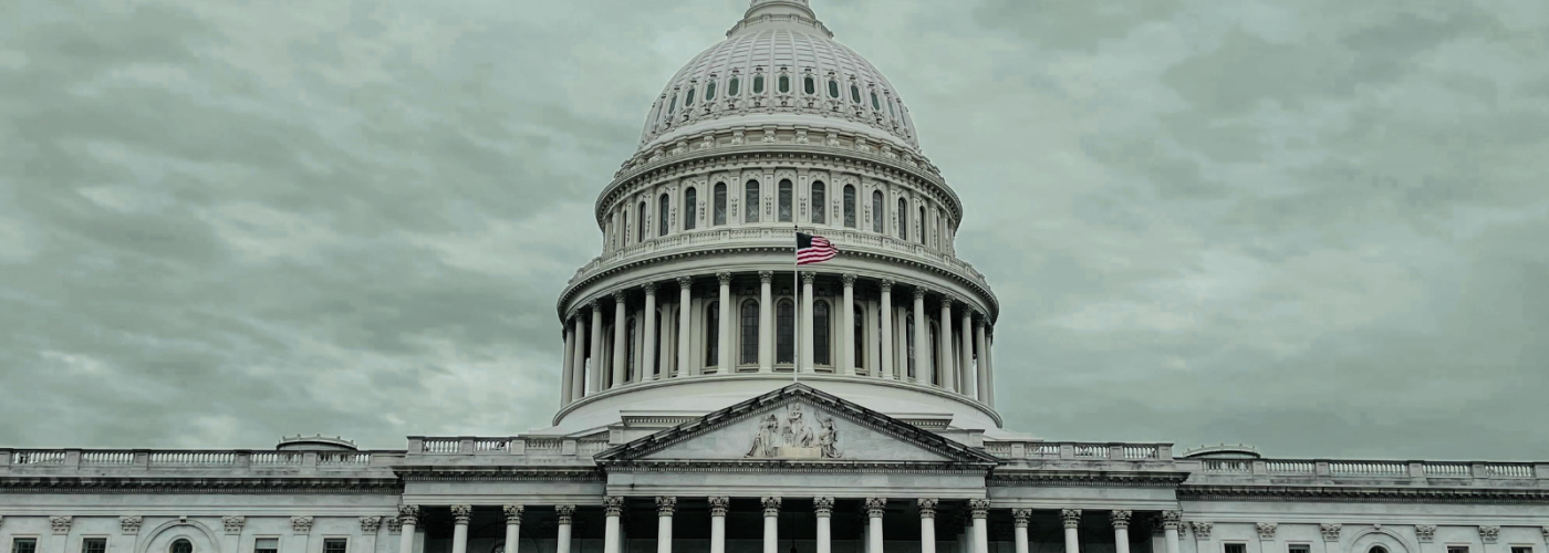 U.S. Capitol building with grey sky