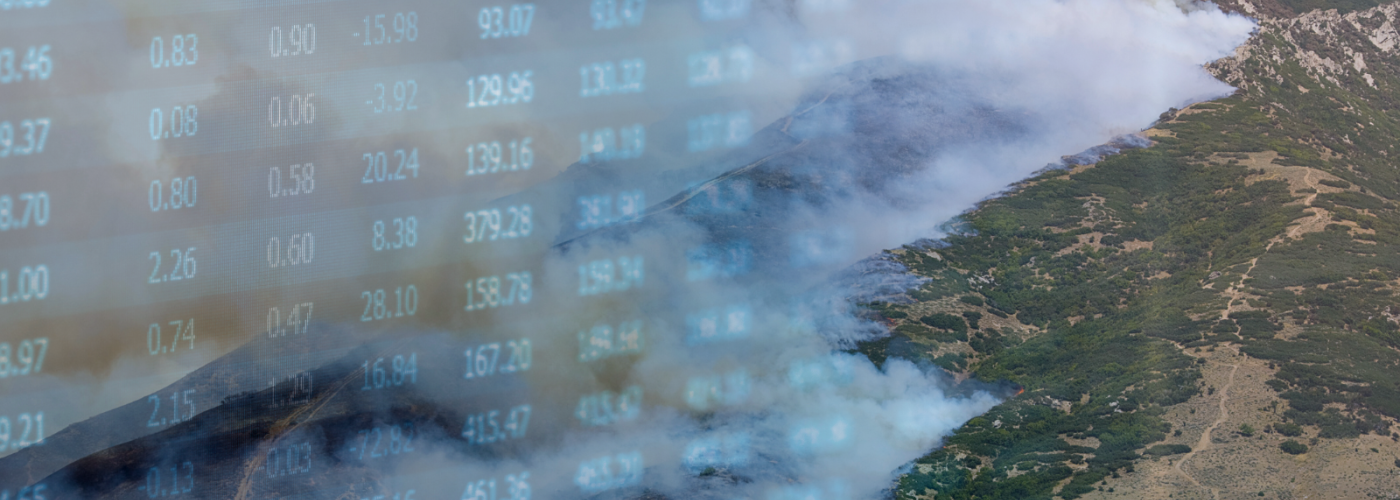 Smoky mountain overlaid with finance market figures