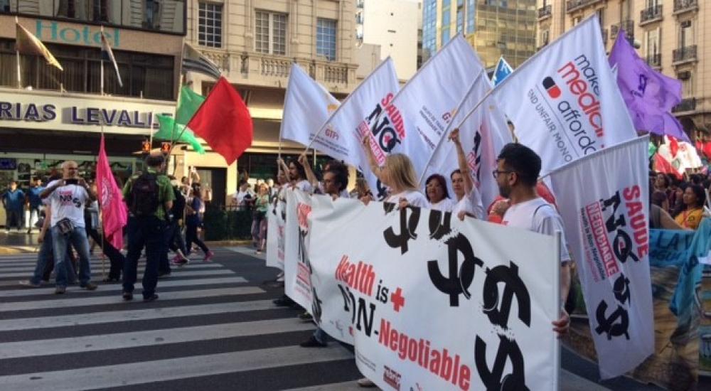 Protesters march outside the WTO's Ministerial Conference in Buenos Aires, Argentina. Photo by Sophia Murphy.