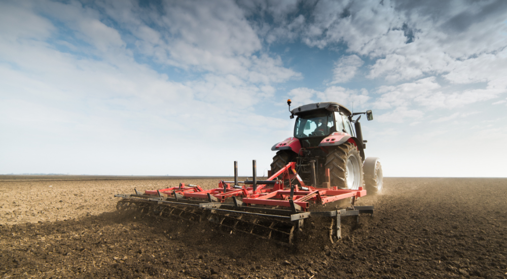 Tractor on dirt field