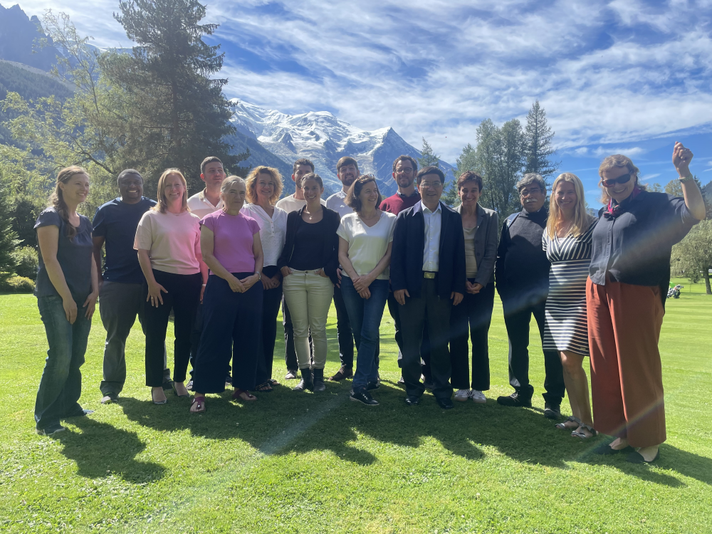 Group photo in front of Swiss Alps