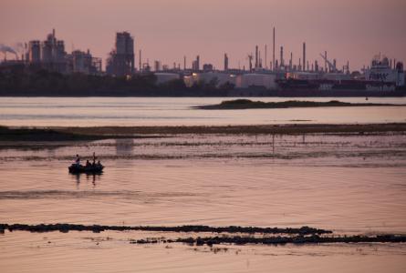 Polluted water next to refinery