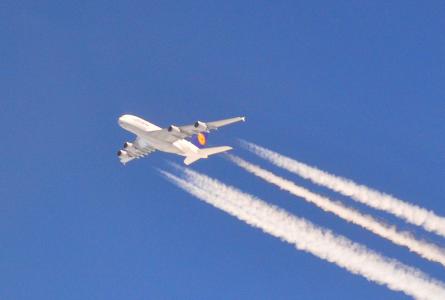 Airplane with big contrail