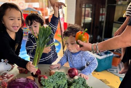 Children receiving vegetables