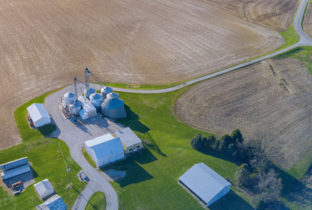 aerial view of conventional farm with bare soil