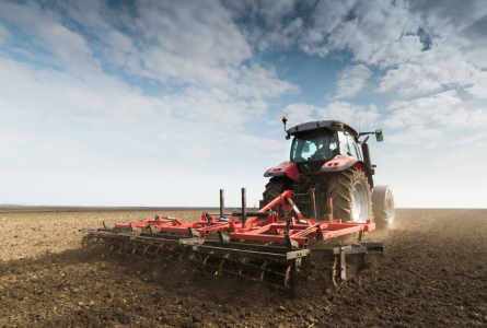 Tractor on dirt field